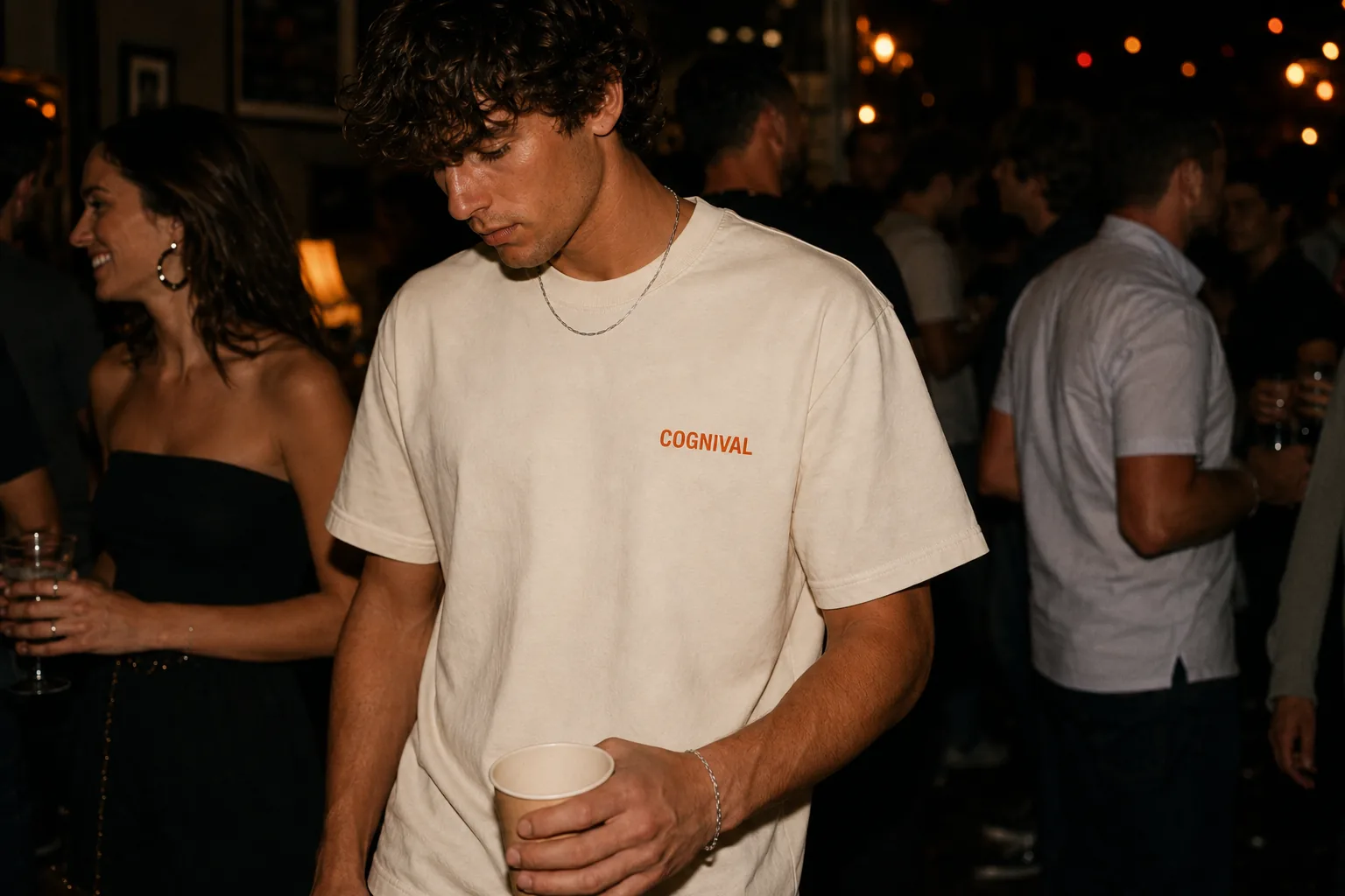 Cognival Day 1s member wearing the included limited-edition T-shirt