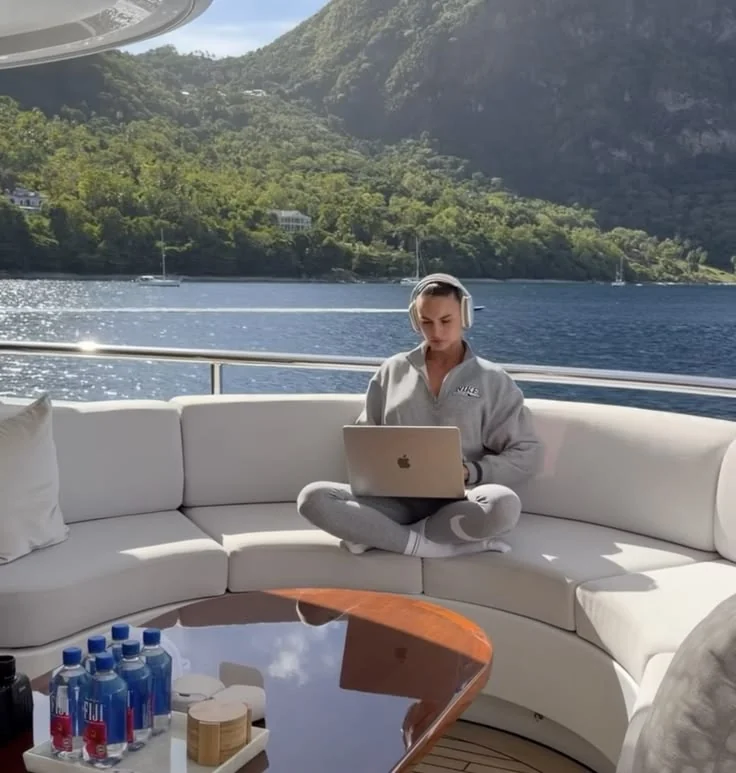 Focused laptop work on a boat